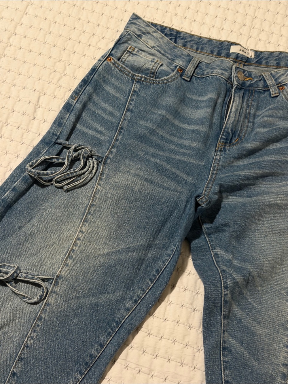 Women's Light Blue Flare Jeans with Distressed Ties